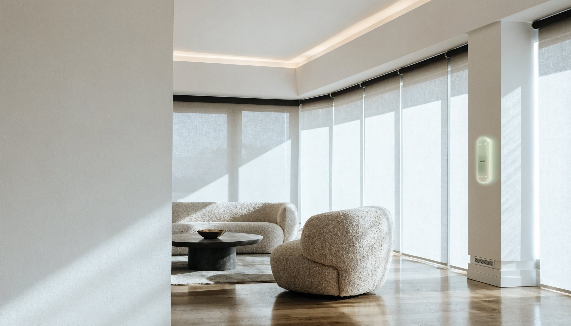A bright modern smart home with motorized shades and a wall control keypad